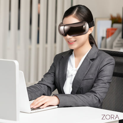 Zora Smart Heated Eye Massager with air pressure and music feature, designed for premium eye care and relaxation.
