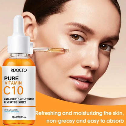 Zora Vitamin C face serum with thermal spring water in a clear glass bottle, featuring dropper applicator and bright citrus label.
