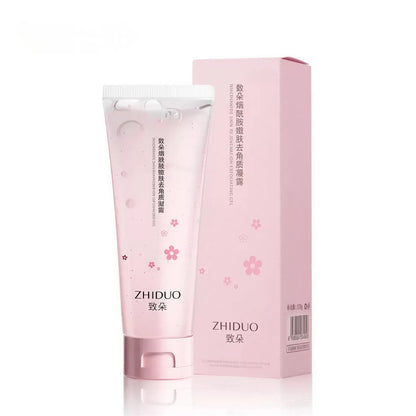 Zora Cherry Blossom Exfoliating Gel in a clear tube with cherry blossom illustrations, showcasing its gentle exfoliation formula.