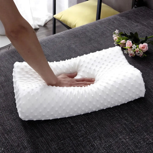 Zora adjustable memory foam pillow for side sleepers, showing the contoured shape and soft cover fabric for comfortable rest.