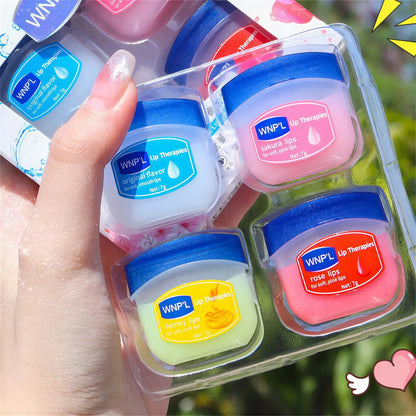 Zora Lip Mask and Balm Care Set with hydrating lip care products, featuring sleek containers and a luxurious lip care ritual setup.