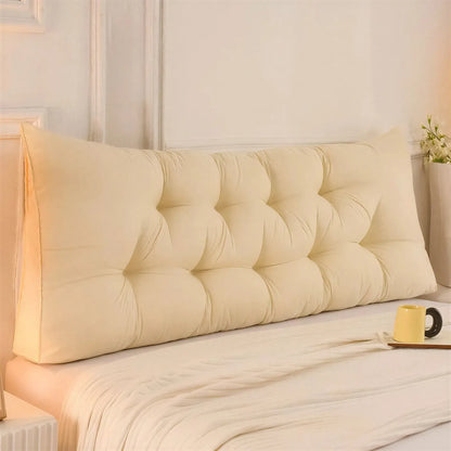Zora triangular wedge headboard cushion for bed and sofa comfort, soft pillow with supportive design, in neutral fabric.