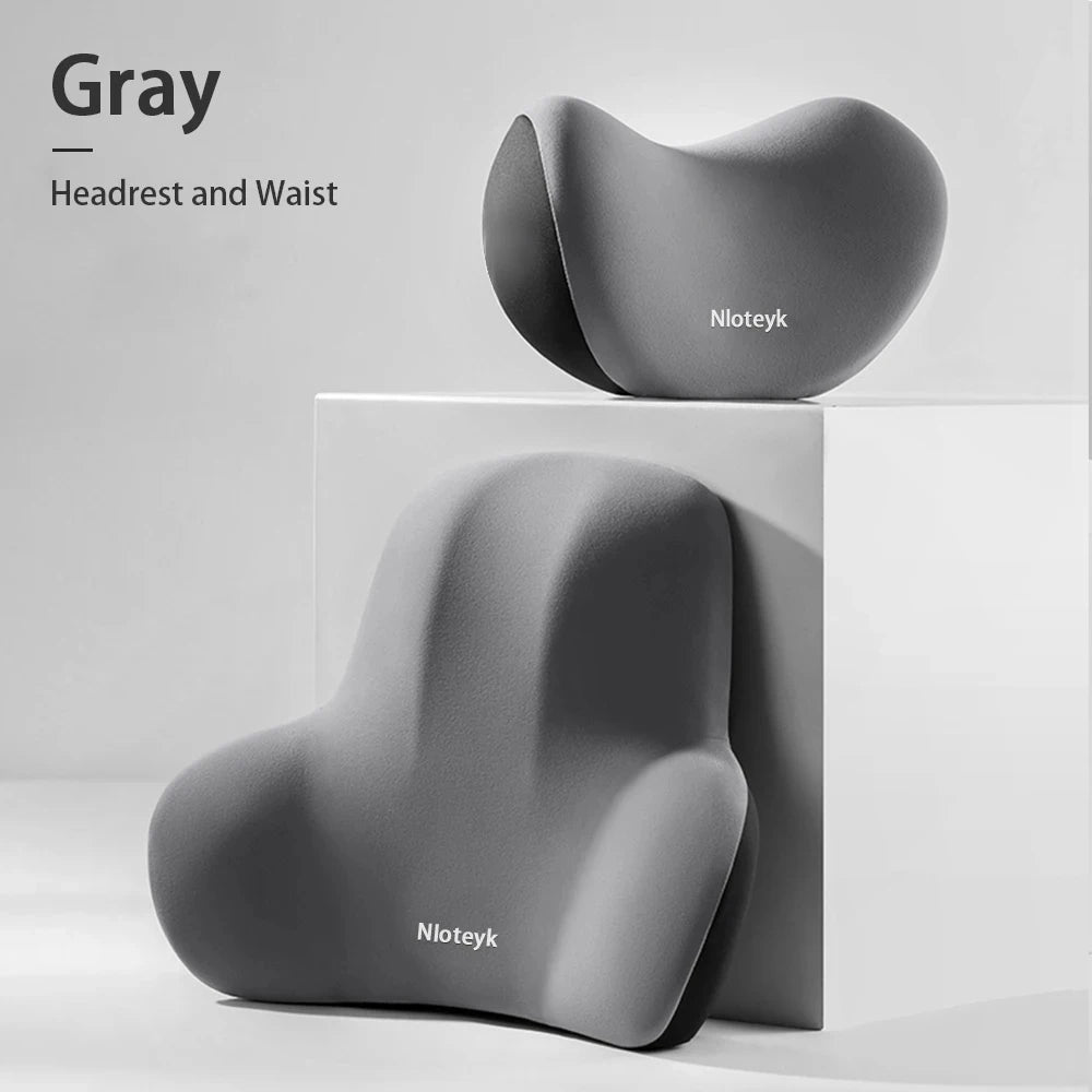 Zora Memory Foam Car Headrest Pillow attached to a car seat for neck support and comfort during travel.