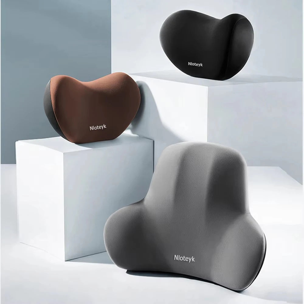 Zora Memory Foam Car Headrest Pillow attached to car seat for comfort and support during travel.
