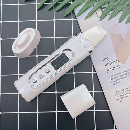 Zora Ultrasonic Facial Skin Scrubber device for deep cleansing and exfoliation, with a sleek design and textured surface.
