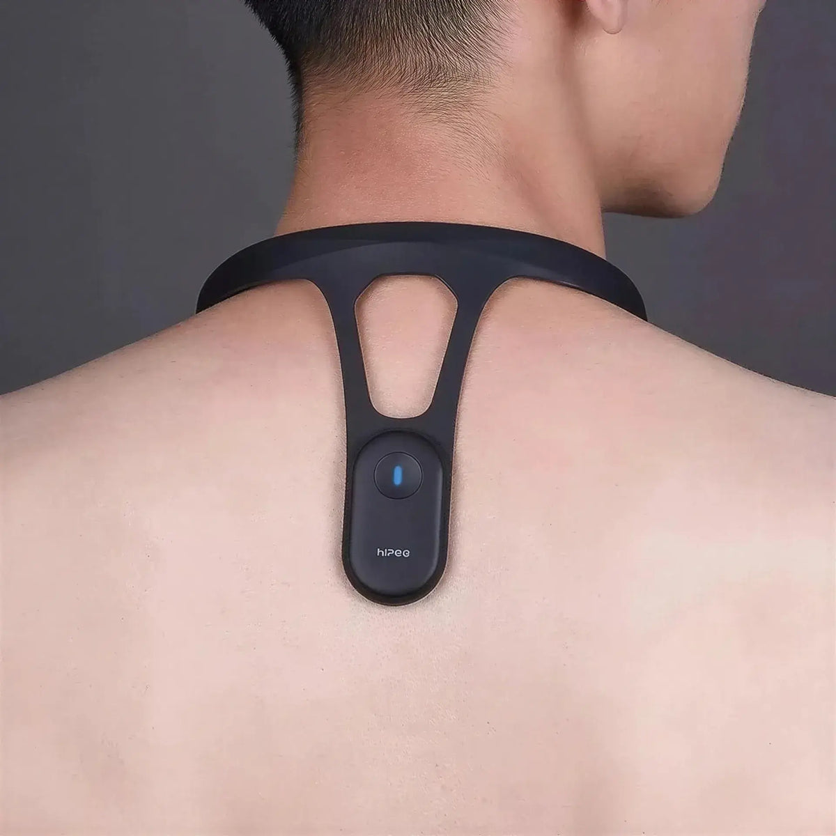 Zora Smart Posture Corrector with app tracking, adjustable straps, and ergonomic design to improve posture and spinal alignment.