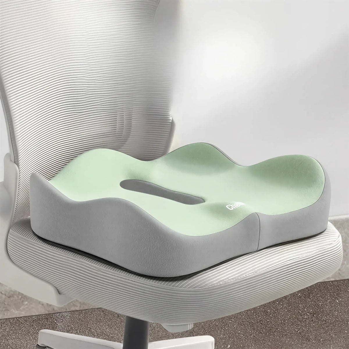 Zora 3D ergonomic memory foam seat cushion with supportive design and breathable cover, ideal for office or home use.