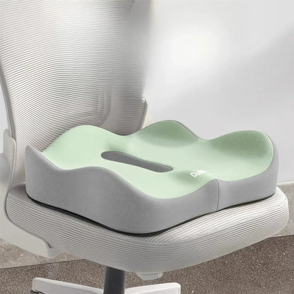 Zora 3D ergonomic memory foam seat cushion with supportive design and breathable cover, ideal for office or home use.
