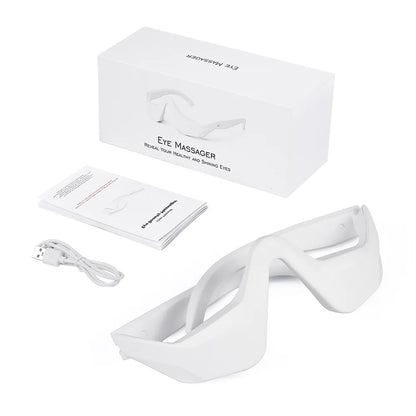 Zora 3D Eye Relaxation Massager wearable eye care device with padded eye cushions and adjustable strap for soothing relief.