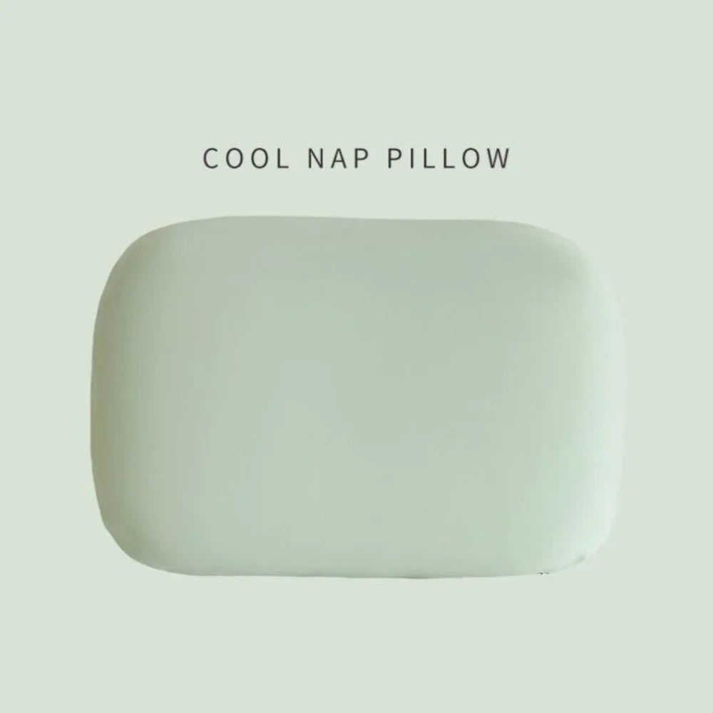 Zora portable macaron-shaped neck support pillow, travel accessory for comfortable neck relaxation during trips.