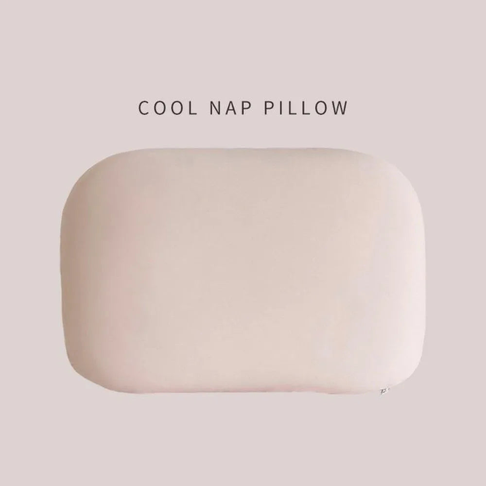 Zora portable macaron-shaped neck support pillow, travel accessory for comfortable neck cushioning on the go.